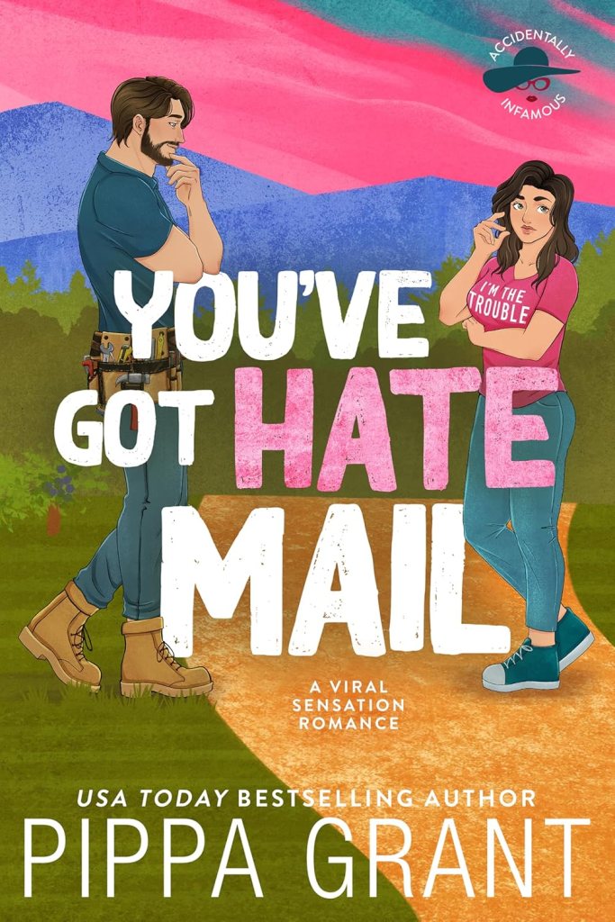 You've Got Hate Mail by Pippa Grant book cover featuring a bearded handyman and a brunette woman standing on a country path beneath a pink sky. The illustrated contemporary romance cover includes the subtitle "A Viral Sensation Romance" and is the first book in the Accidentally Infamous series.